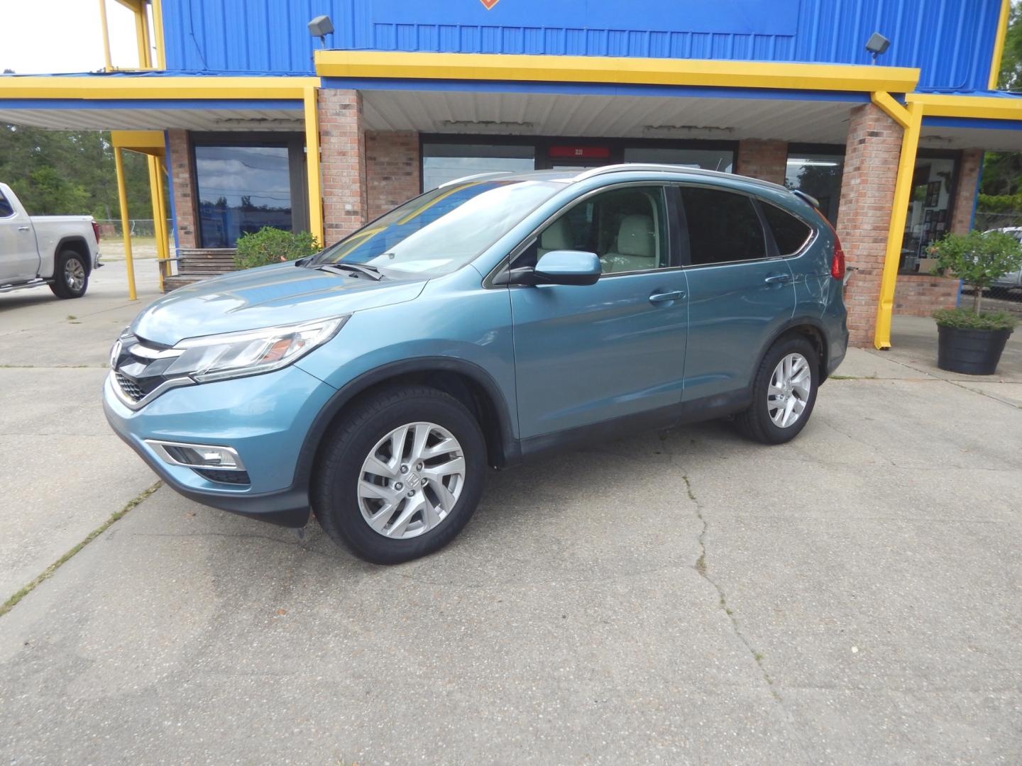 2015 Teal /Tan Honda CR-V (2HKRM3H53FH) with an 2.4L 4 cyl. engine, Automatic transmission, located at 3120 W Tennessee St, Tallahassee, FL, 32304-1002, (850) 575-6702, 30.458841, -84.349648 - Used Car Supermarket is proud to present you with this loaded immaculate 2015 Honda CRV EX with sunroof and low miles. Used Car Supermarket prides itself in offering you the finest pre-owned vehicle in Tallahassee. Used Car Supermarket has been locally family owned and operated for over 48 years. Ou - Photo#0